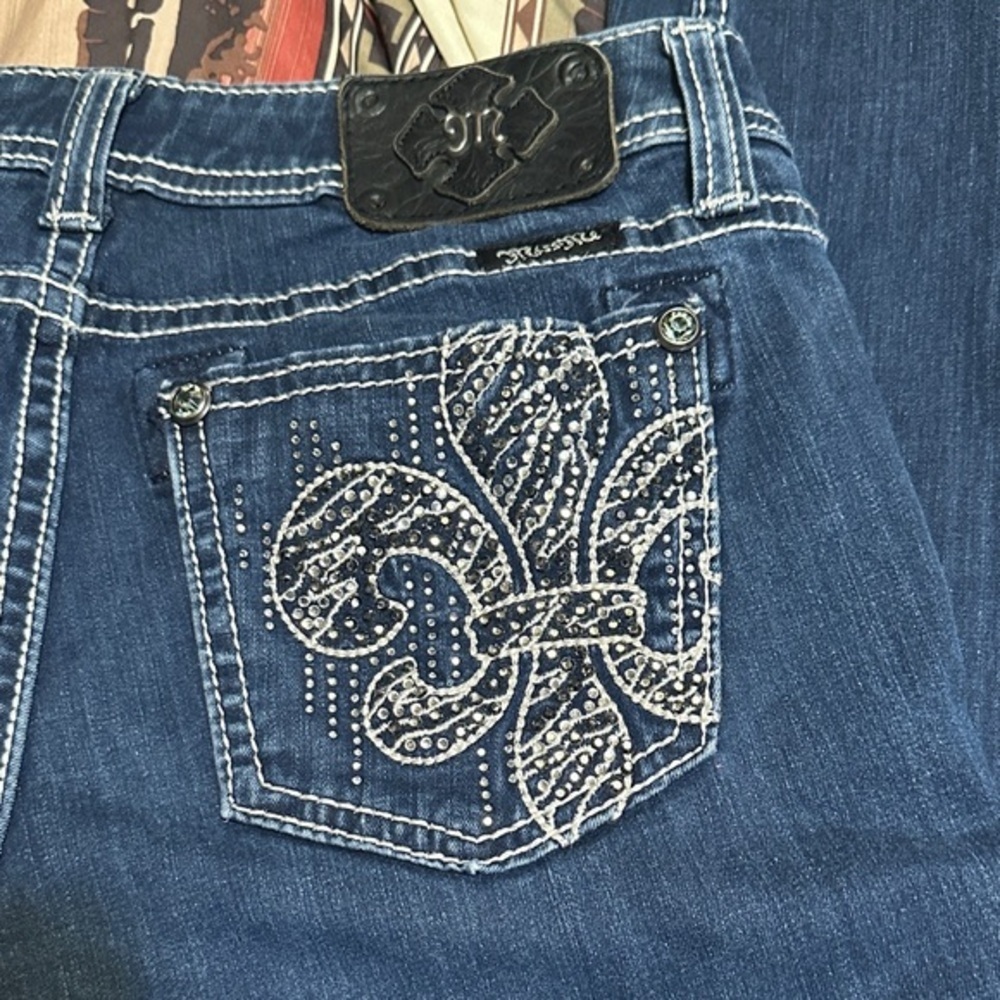 151.  Miss Me Dark Blue Skinny Jeans with Embellished Fleur-de-Lis